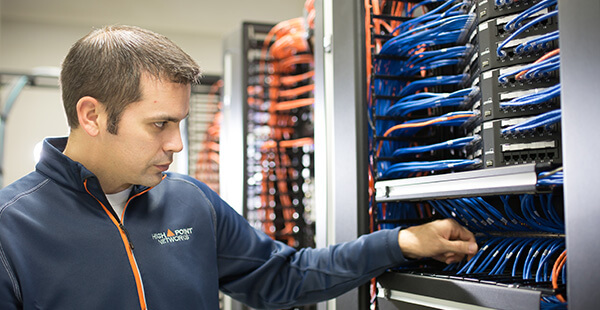 Network engineer working in a data center