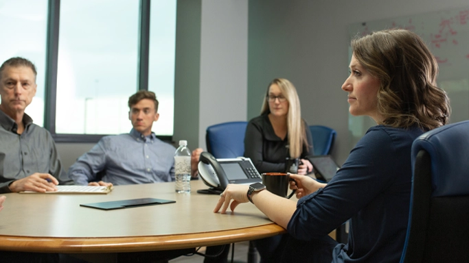 High Point Networks employees collaborating in conference room