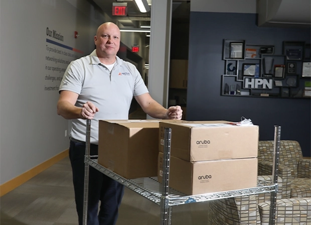 Technology careers employee pushing boxes