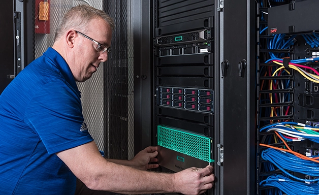 Employees installing professional data center solutions