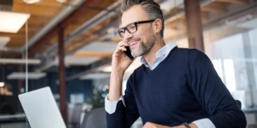 Man using Mitel business communication system