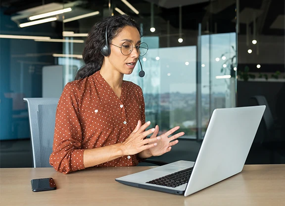 Woman using unified communications from High Point Networks