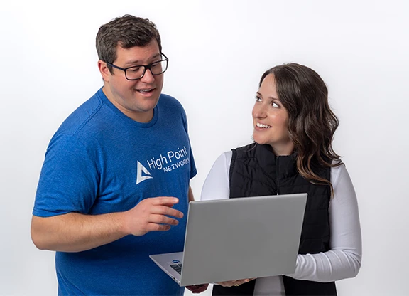 High Point Networks employee helping a client with cloud services
