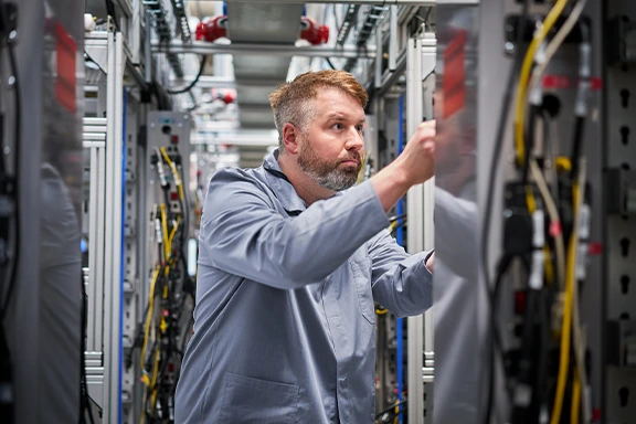 Employee installing data center services by High Point Networks with HPE